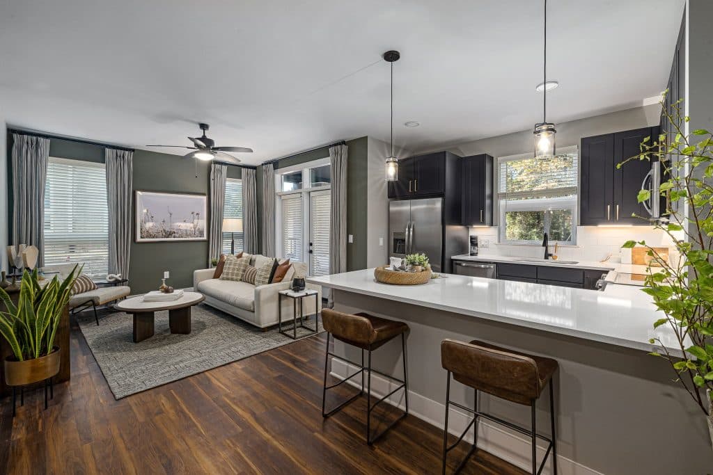 Open living room and kitchen with breakfast bar layout