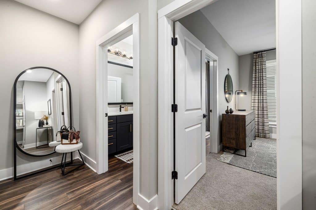 Hallway with bedroom and bathroom doors